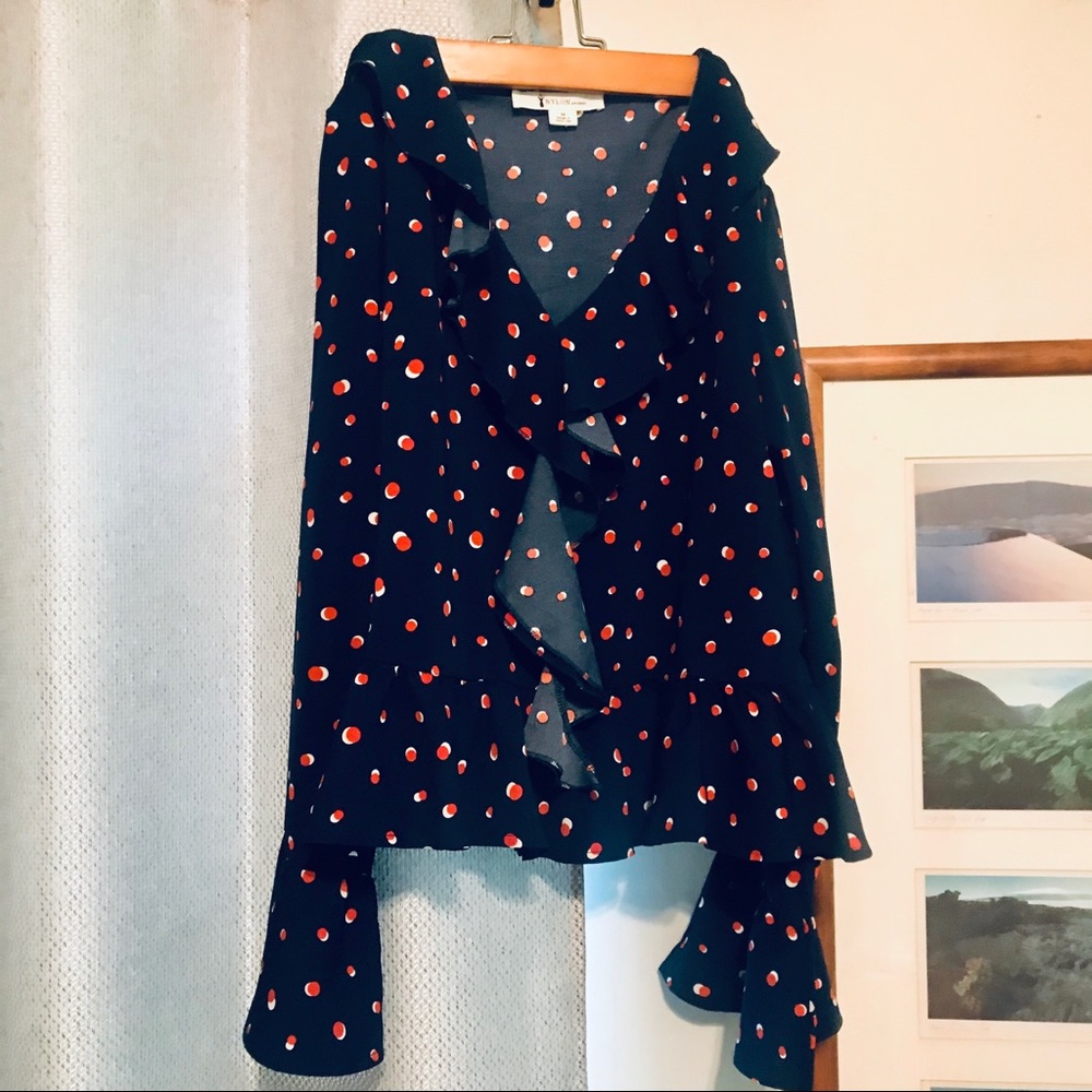 polka dot blouse with ruffle detail
